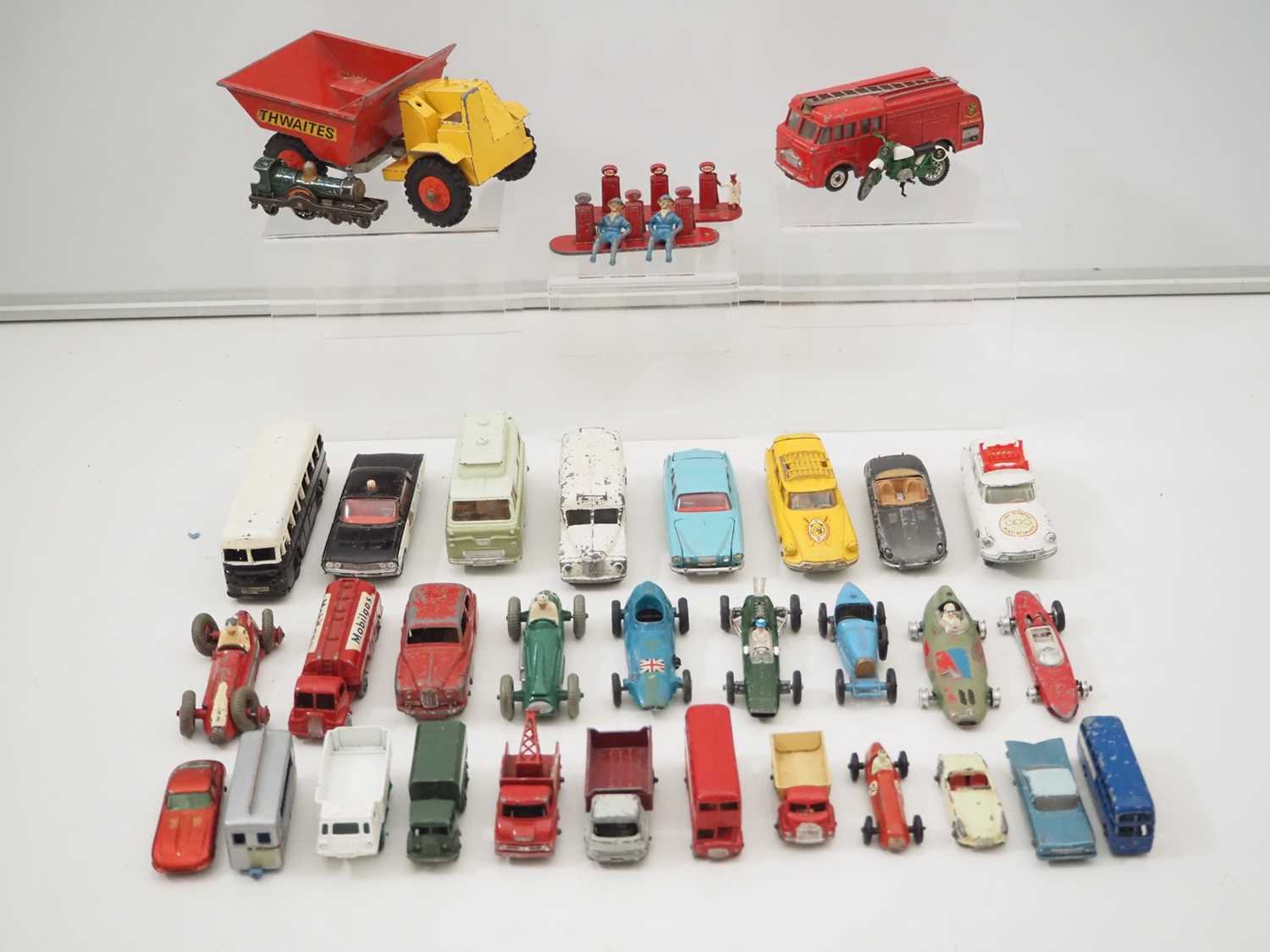Lot 91 - A large group of playworn DINKY, CORGI and...