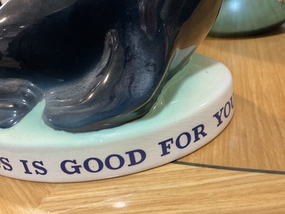 Lot 404 - GUINNESS: Carlton Ware Sealion Lamp with...