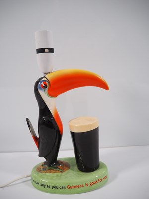 Lot 405 - GUINNESS: Carlton Ware Toucan lamp base - 43cm...