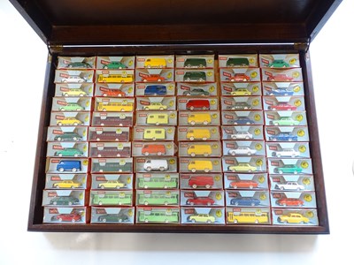 Lot 140 - A wooden presentation case containing 66...