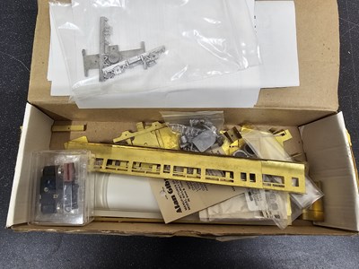 Lot 521 - A group of part built OO gauge brass and white...