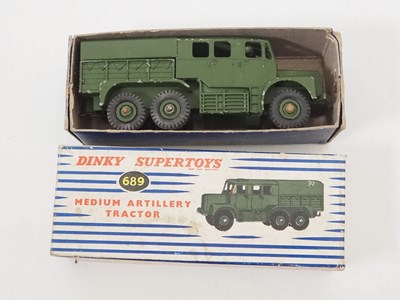 Lot 8 - A pair of DINKY Supertoys military vehicles...