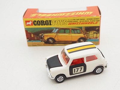 Lot 117 - A CORGI WHIZZWHEELS 282 Mini Cooper in white...
