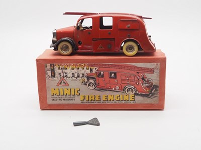 Lot 186 - A TRIANG MINIC 62ME pre-war tinplate clockwork...