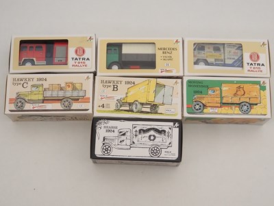Lot 194 - A group of retro style tinplate lorries...