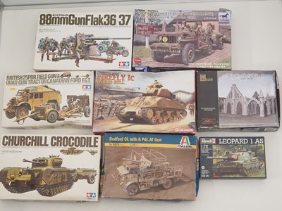 Lot 222 - A group of unbuilt plastic military vehicle...