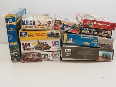 Lot 227 - A group of unbuilt plastic military vehicle...