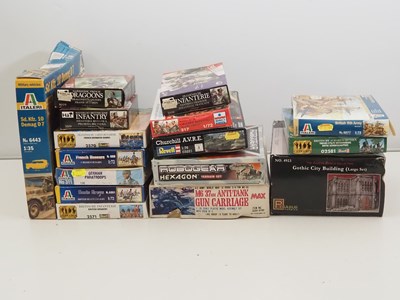 Lot 228 - A group of unbuilt plastic military vehicle...