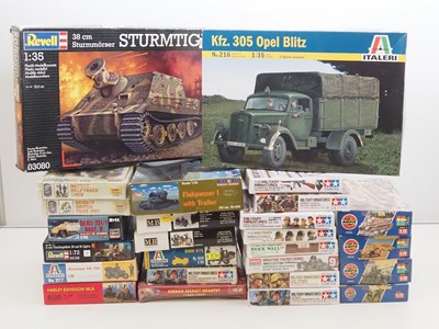 Lot 230 - A group of unbuilt plastic military vehicle...