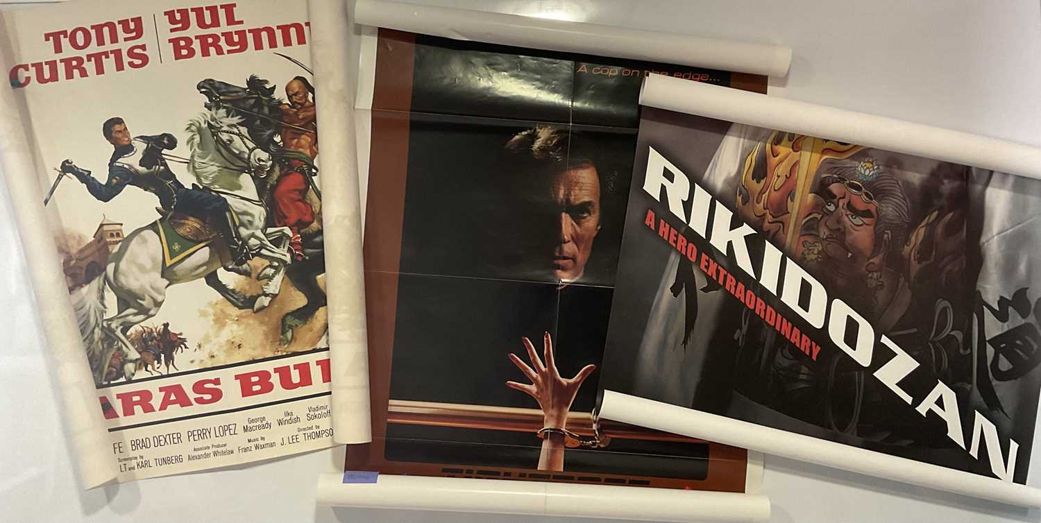 Lot 40 - A group of three action film posters...