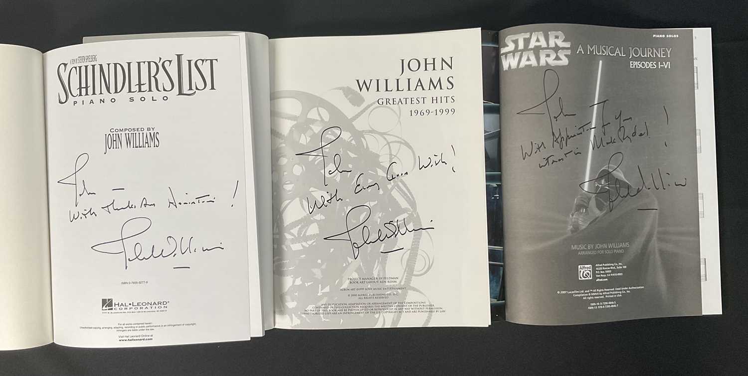 Lot 425 - A group of three JOHN WILLIAMS signed sheet...
