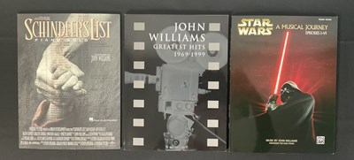 Lot 425 - A group of three JOHN WILLIAMS signed sheet...