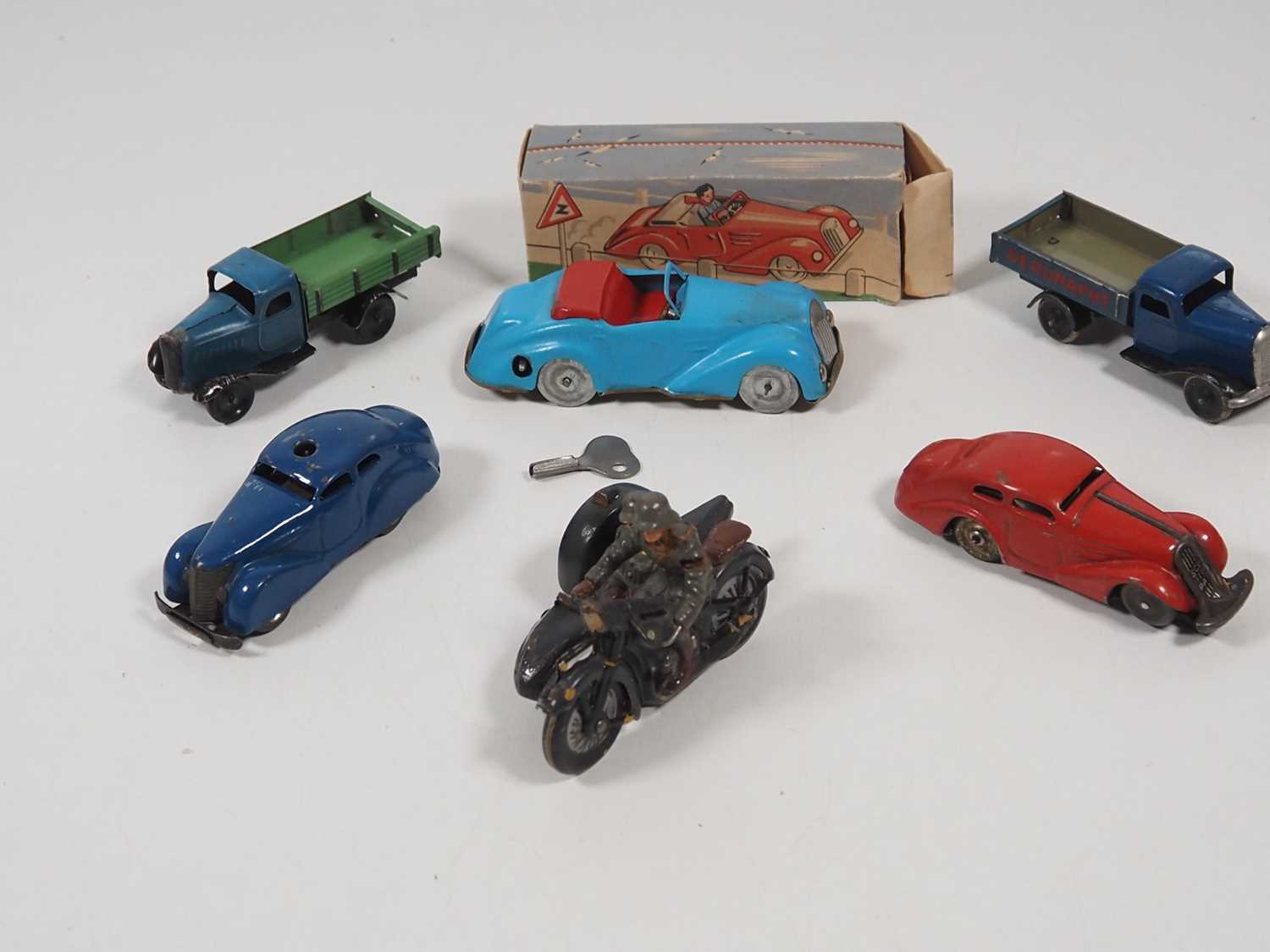 Lot 216 - A group of vintage tinplate and elastolin...