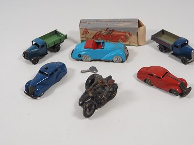 Lot 216 - A group of vintage tinplate and elastolin...