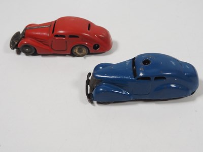 Lot 216 - A group of vintage tinplate and elastolin...