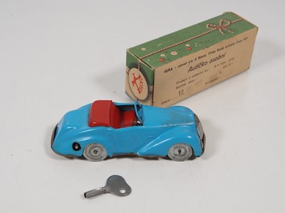 Lot 216 - A group of vintage tinplate and elastolin...