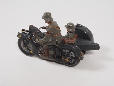Lot 216 - A group of vintage tinplate and elastolin...