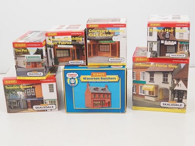 Lot 489 - A high street of HORNBY SKALEDALE OO gauge...