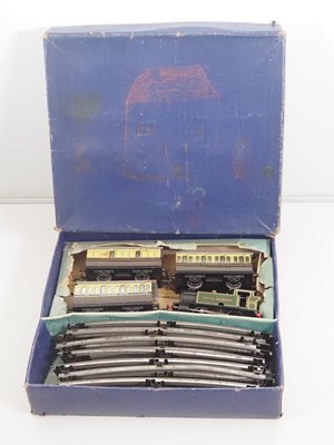Lot 500 - A HORNBY O gauge clockwork GWR tank passenger...