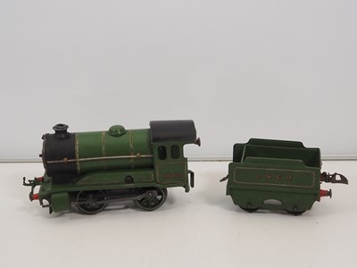 Lot 502 - A pair of HORNBY O gauge clockwork train sets...