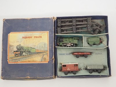 Lot 502 - A pair of HORNBY O gauge clockwork train sets...