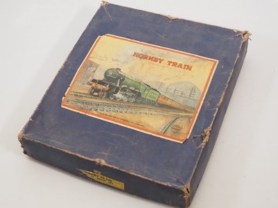 Lot 502 - A pair of HORNBY O gauge clockwork train sets...