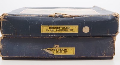 Lot 502 - A pair of HORNBY O gauge clockwork train sets...