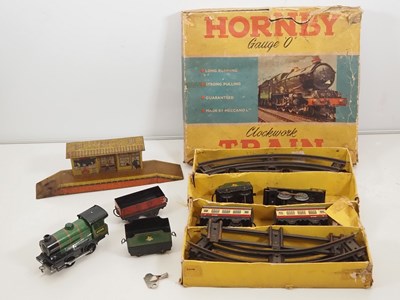 Lot 503 - A HORNBY O gauge clockwork No 21 passenger set...