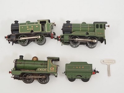 Lot 514 - A group of HORNBY O gauge clockwork...