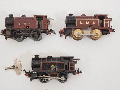 Lot 515 - A group of HORNBY O gauge clockwork tank...