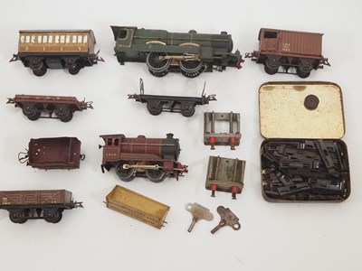 Lot 554 - A quantity of HORNBY O gauge clockwork engines,...