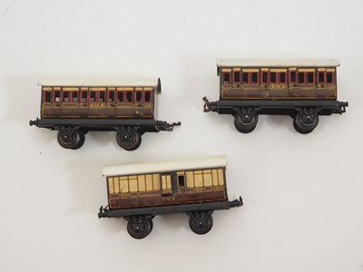 Lot 572 - A group of O gauge very early BING 4-wheel...