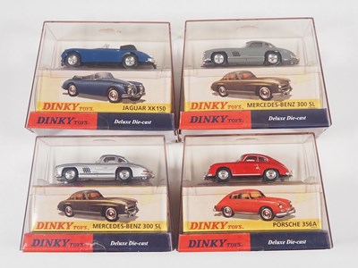 Lot 73 - A group of DINKY diecast Deluxe issues in...