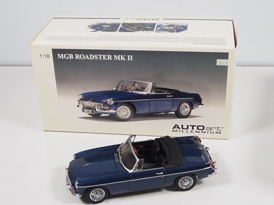 Lot 106 - A pair of diecast MG cars comprising an...
