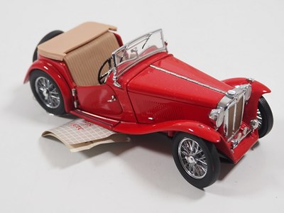 Lot 106 - A pair of diecast MG cars comprising an...