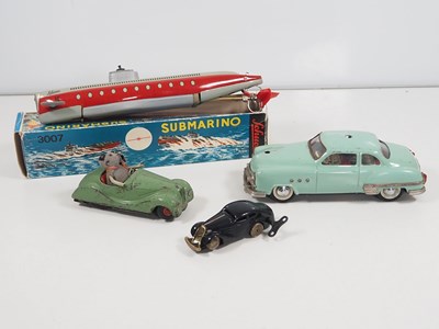 Lot 210 - A group of SCHUCO vintage tinplate vehicles...