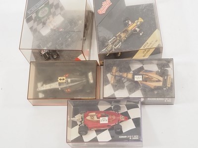 Lot 14 - A mixed group of boxed diecast racing cars by...