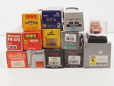 Lot 14 - A mixed group of boxed diecast racing cars by...