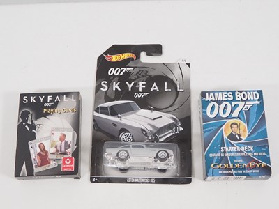 Lot 22 - A group of carded diecast cars by CORGI and...