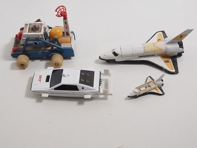 Lot 23 - A group of diecast James Bond related vehicles...