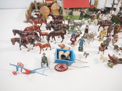 Lot 31 - A large quantity of diecast farm animals,...