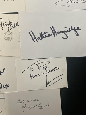 Lot 23 - A collection of celebrity autographs on...