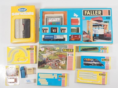 Lot 288 - A group of HO gauge FALLER AMS motorised...