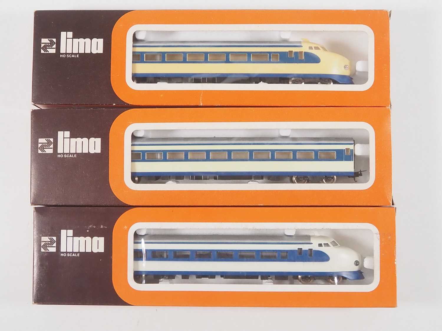 Lot 295 - A LIMA HO gauge Japanese outline 3-car