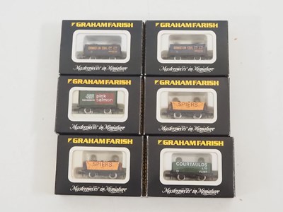Lot 2 - A group of GRAHAM FARISH N gauge wagons in...