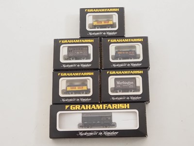 Lot 2 - A group of GRAHAM FARISH N gauge wagons in...