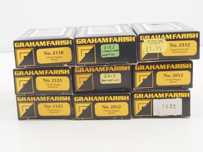 Lot 2 - A group of GRAHAM FARISH N gauge wagons in...