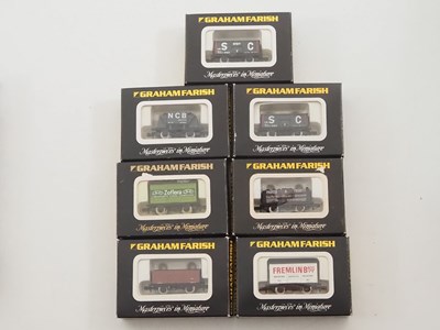 Lot 13 - A group of GRAHAM FARISH N gauge wagons in...