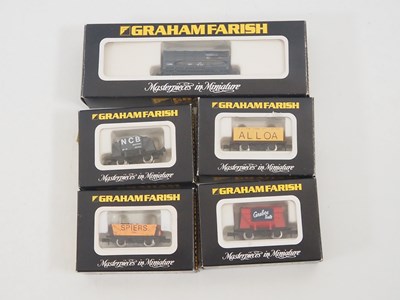 Lot 13 - A group of GRAHAM FARISH N gauge wagons in...