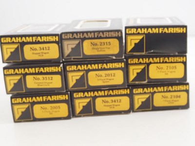 Lot 13 - A group of GRAHAM FARISH N gauge wagons in...